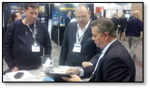 131112l Sam Kilmer and our friend John Gallo from TDECU being wowed by Mitek’s new app